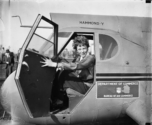 ”Amelia Earhart in an airplane”