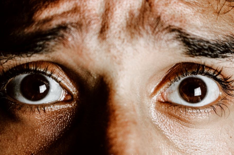 Closeup photo of frightened eyes