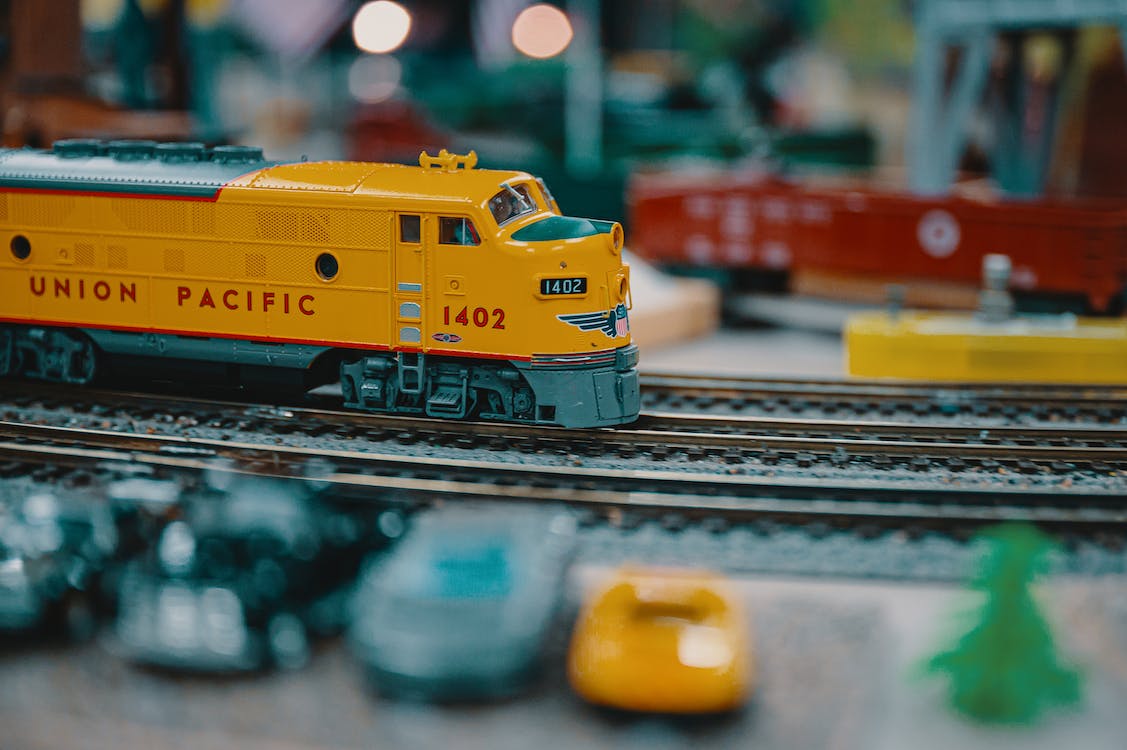 Miniature Train Model running on train tracks
