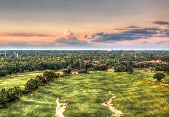 aerial-view-of-a-golf-course-in-Florida-during-sunset