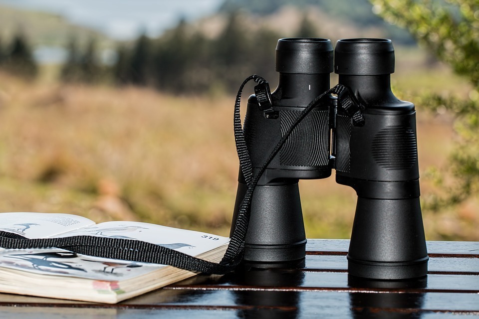 A-black-binoculars-on-a-table