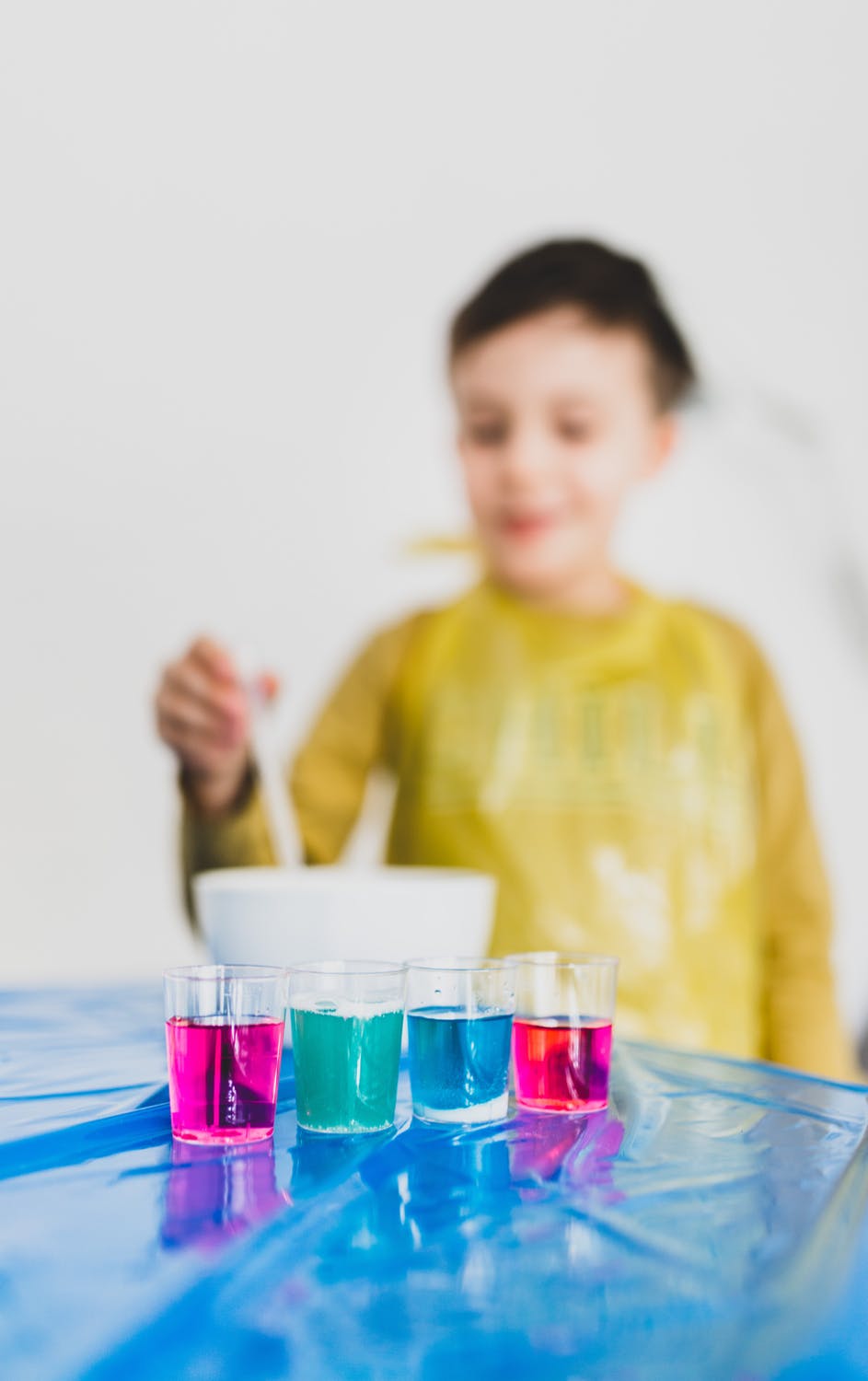 A-kid-preparing-colorful-liquids