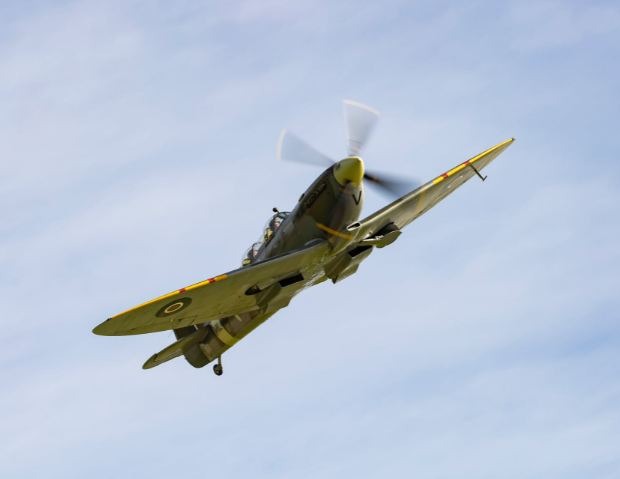 White-and-Yellow-Spitfire-Plane-in-Midair