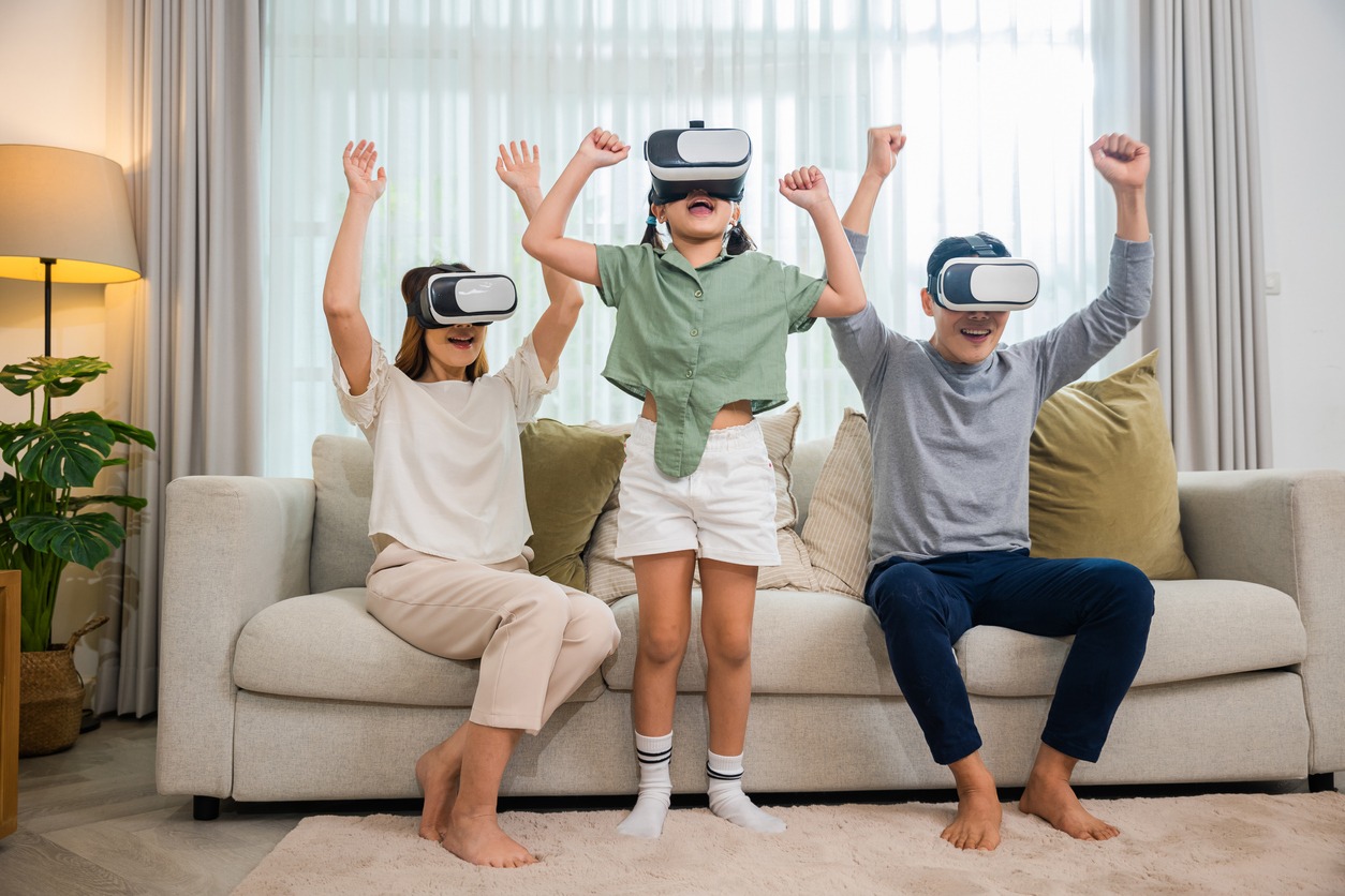 a family wearing virtual reality headsets