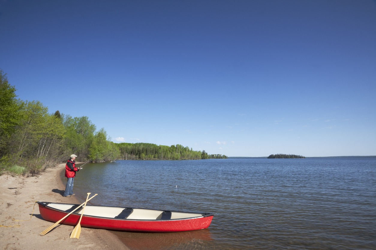 a man ready to go fishing at the Boundary Waters Canoe Area Wilderness