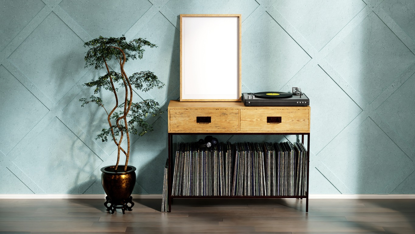 A large wood table with storage for vinyl records and a surface for the turntable
