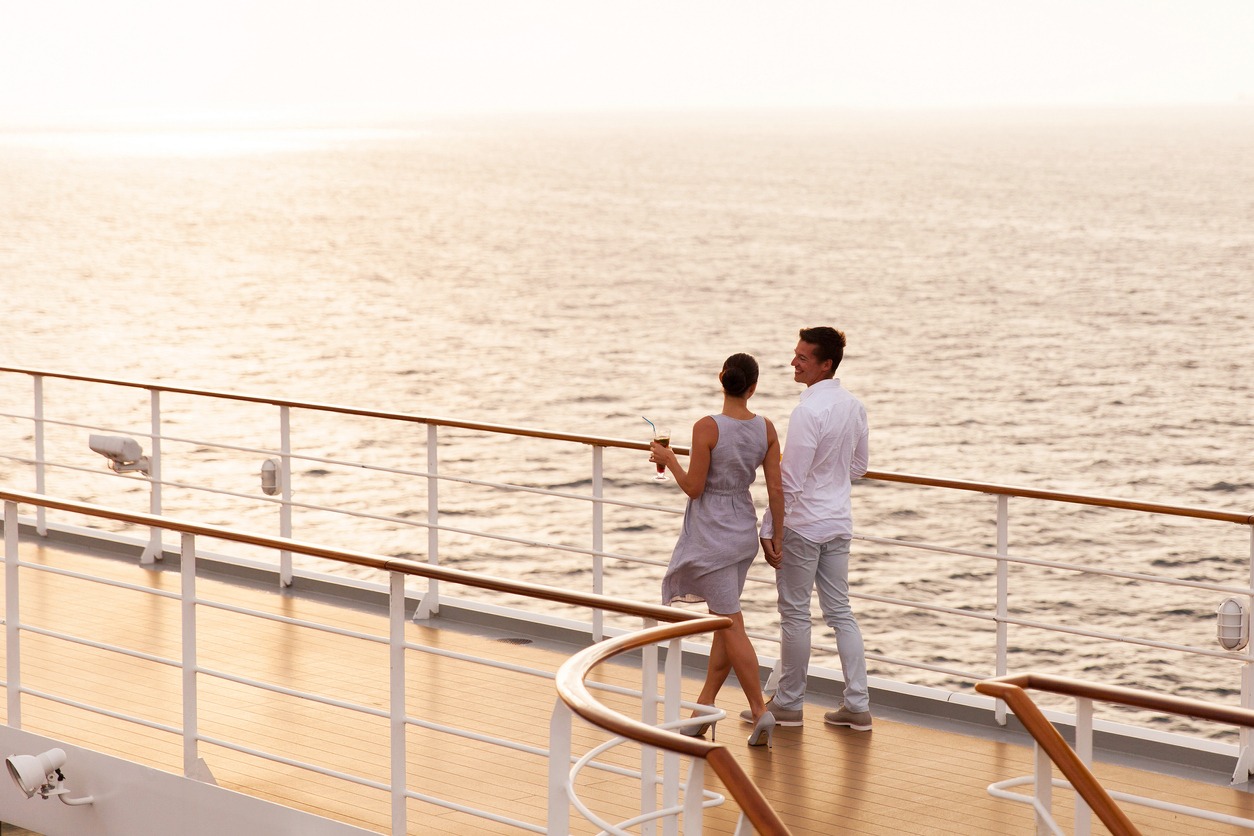 couple-walking-on-cruise-ship-deck