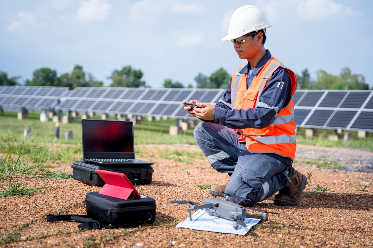 engineers-preparing-drones-to-fly-inspecting-the-solar-cells-at-high-angles