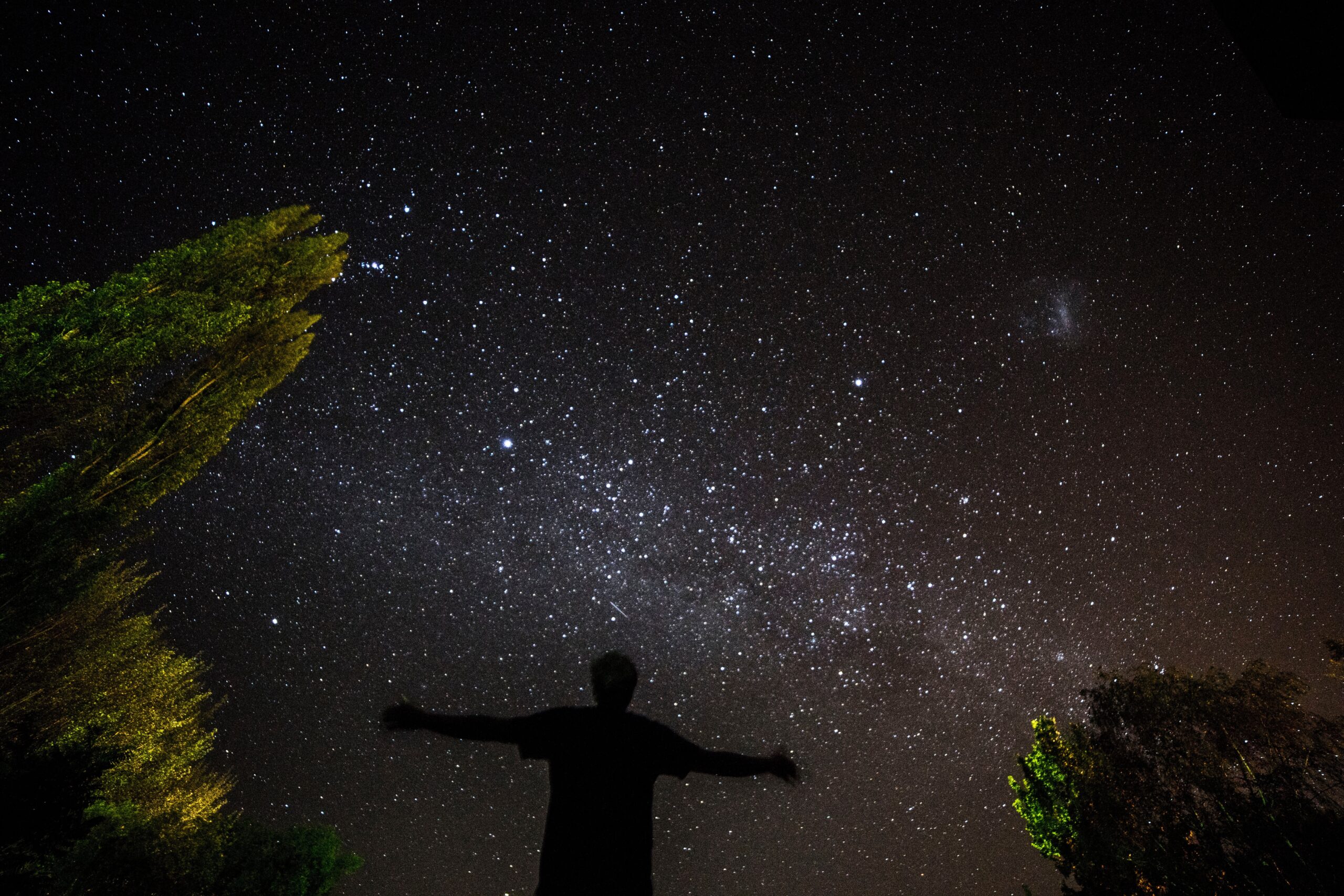 silhouette-of-person-under-starry-sky-scaled