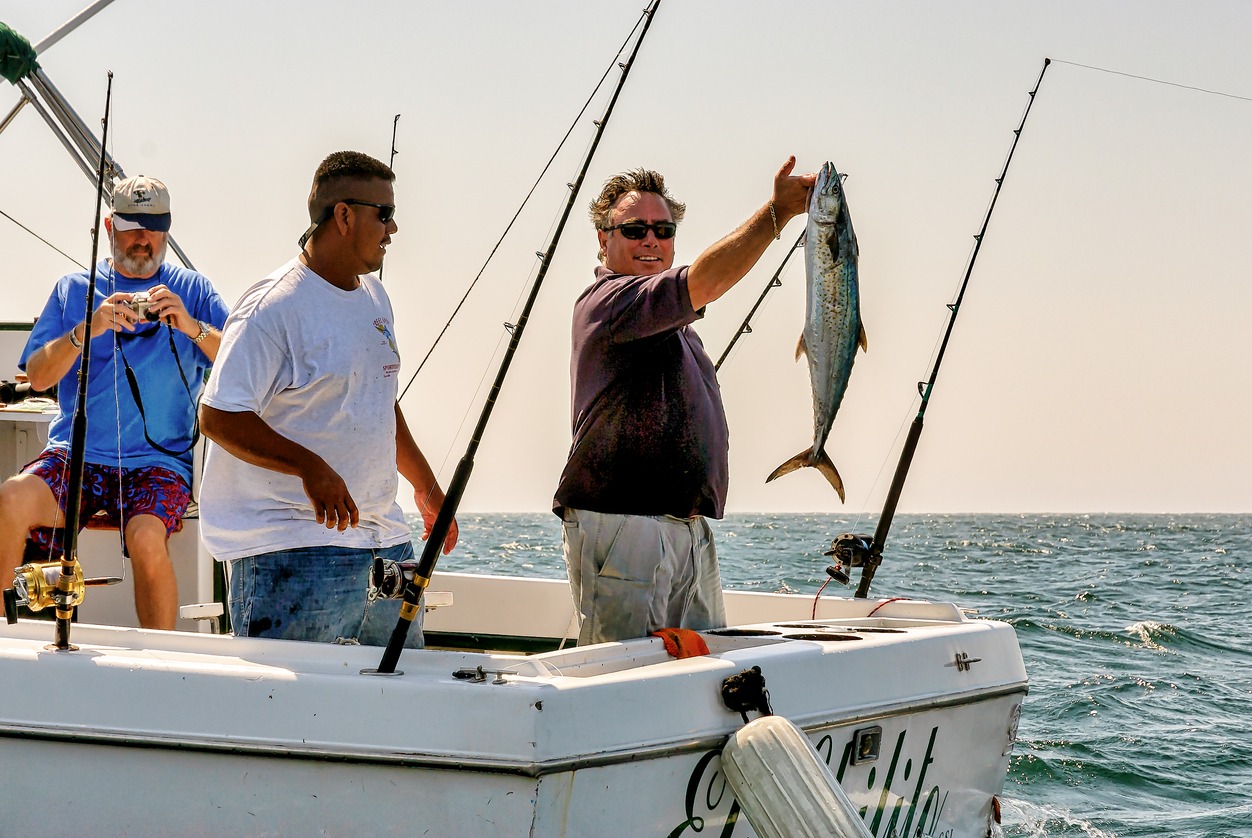 Sports fishermen show their catch of fish near Cabo San Lucas