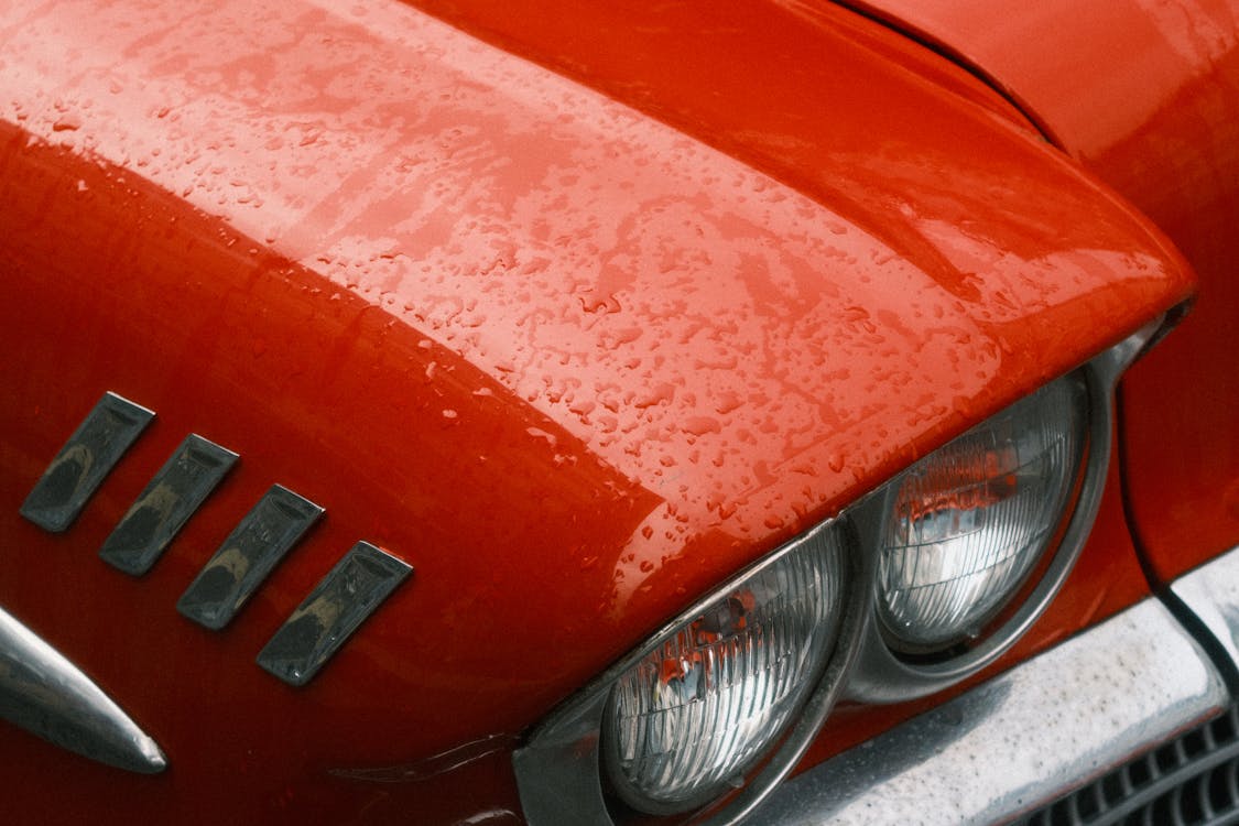 a fragment of a red classic car