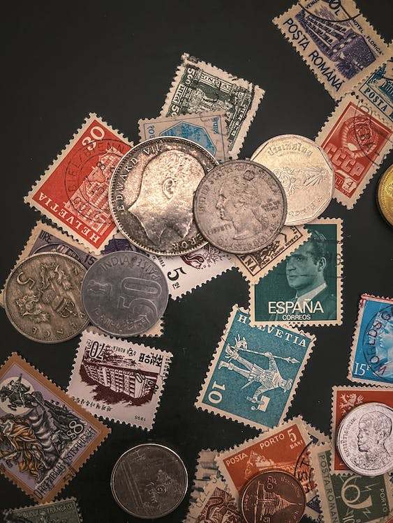 Variety of vintage coins and stamp